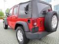 2010 Flame Red Jeep Wrangler Unlimited Sport  photo #3