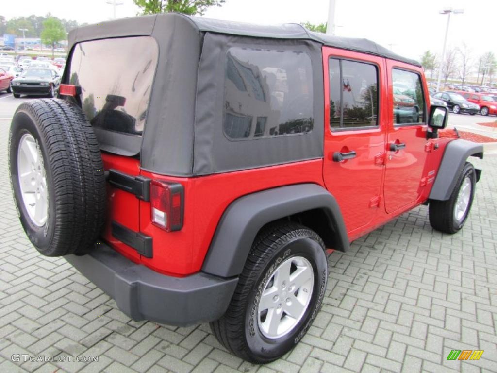 Flame Red 2010 Jeep Wrangler Unlimited Sport Exterior Photo #47842307