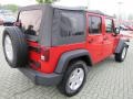 Flame Red 2010 Jeep Wrangler Unlimited Sport Exterior