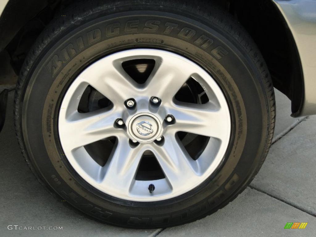 2004 Nissan Pathfinder LE Platinum Wheel Photo #47850104