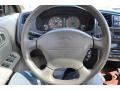 2000 Infiniti G Stone Beige Interior Steering Wheel Photo