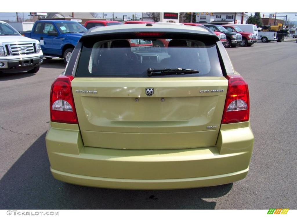 2010 Caliber SXT - Optic Green Metallic / Dark Slate Gray photo #6