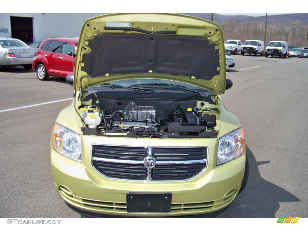 2010 Caliber SXT - Optic Green Metallic / Dark Slate Gray photo #23
