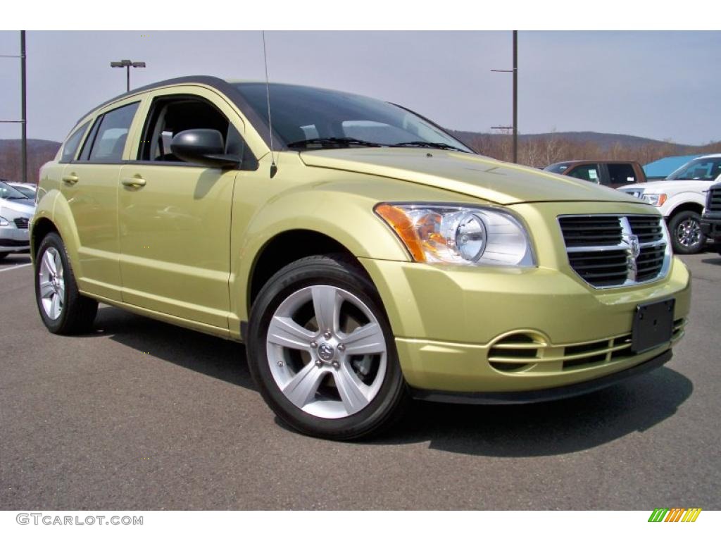 2010 Caliber SXT - Optic Green Metallic / Dark Slate Gray photo #25