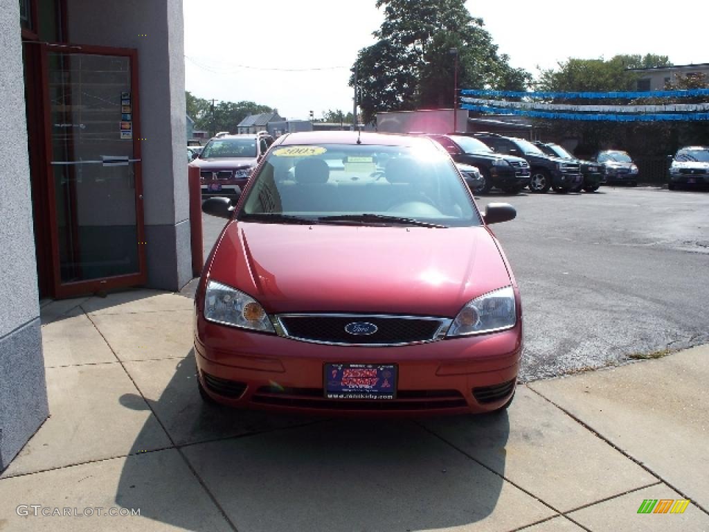 2005 Focus ZX4 SE Sedan - Sangria Red Metallic / Dark Pebble/Light Pebble photo #6