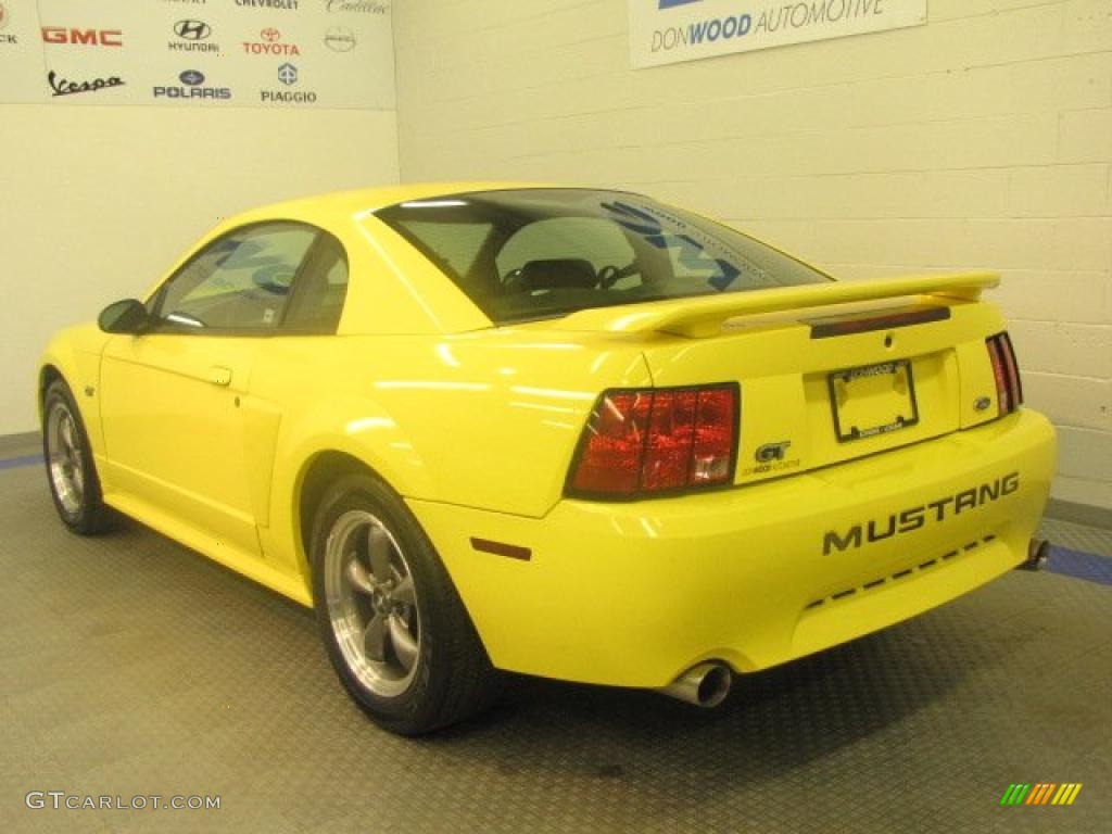 Zinc Yellow 2003 Ford Mustang GT Coupe Exterior Photo #47873228
