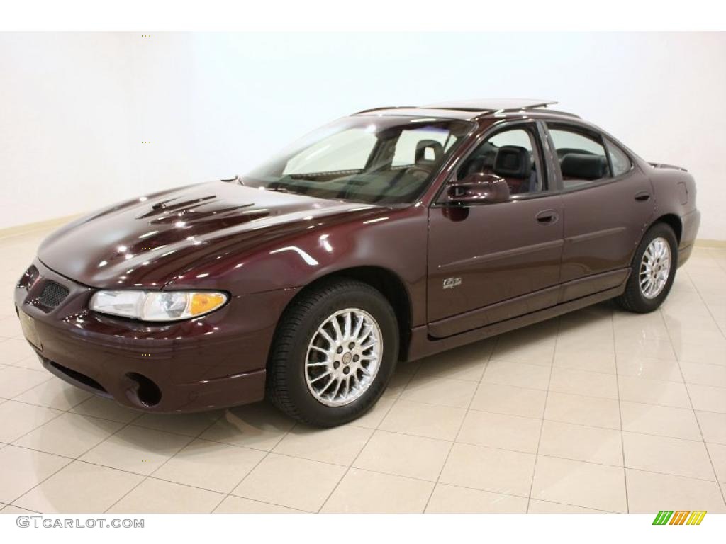 Dark Cherry Red Metallic 2002 Pontiac Grand Prix GT Sedan Exterior Photo #47908626