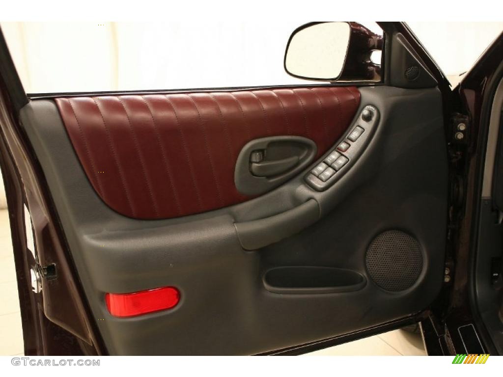 2002 Pontiac Grand Prix GT Sedan Ruby Red Door Panel Photo #47908656