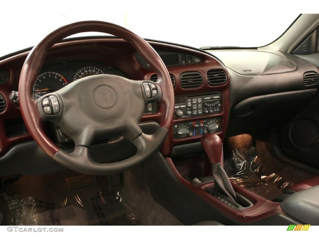 2002 Pontiac Grand Prix GT Sedan Ruby Red Dashboard Photo #47908728