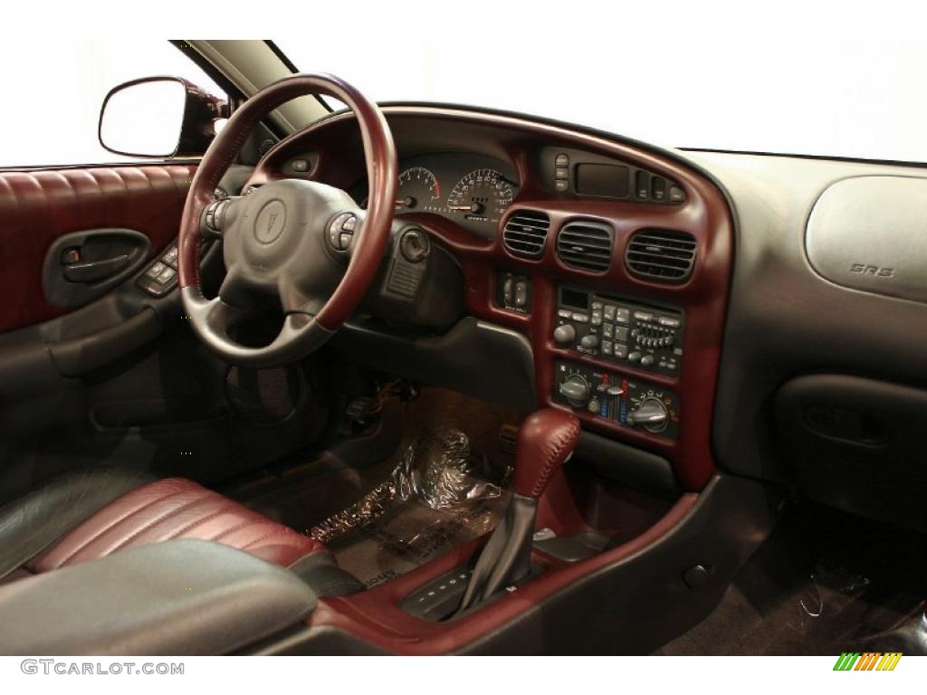 2002 Pontiac Grand Prix GT Sedan Ruby Red Dashboard Photo #47908836