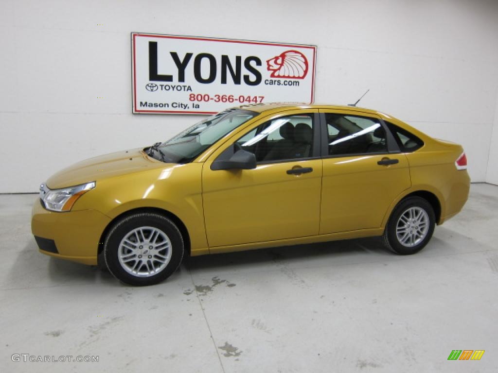 2009 Focus SE Sedan - Amber Gold Metallic / Medium Stone photo #31