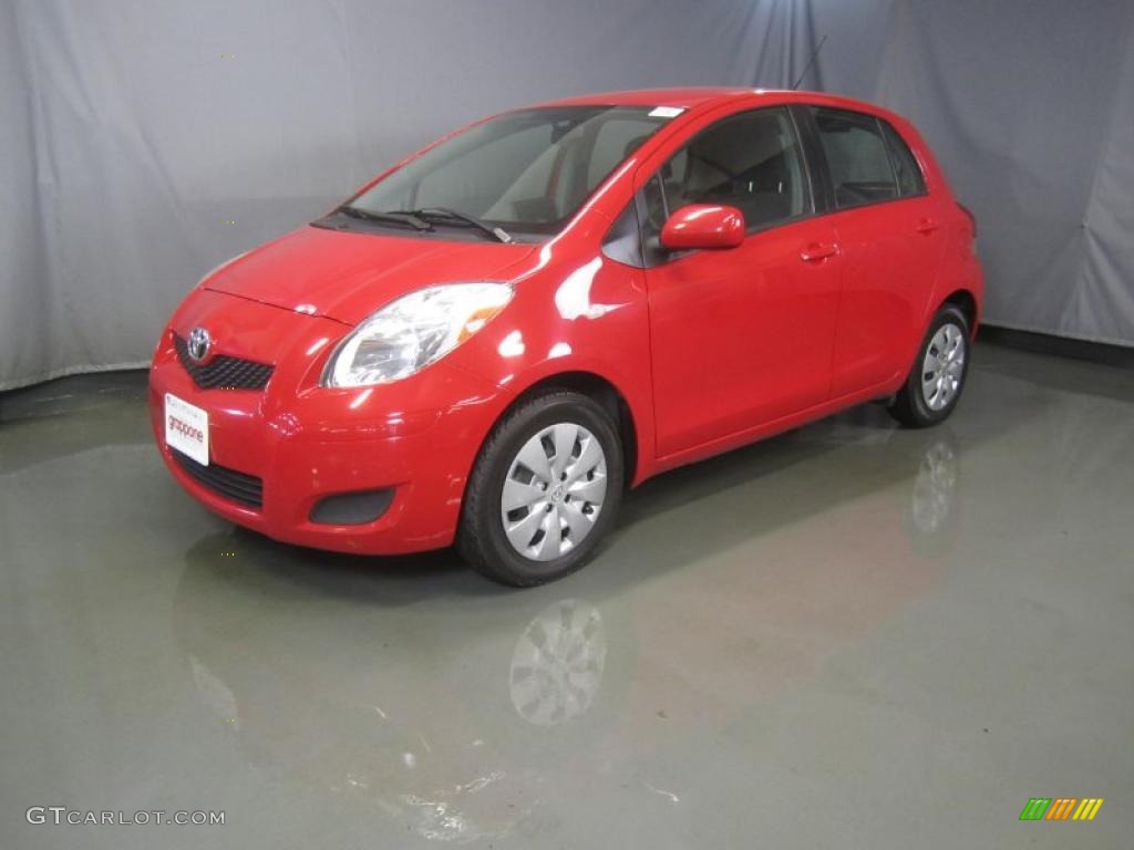 2009 Yaris 5 Door Liftback - Absolutely Red / Dark Charcoal photo #1