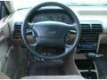 Tan 1994 Ford Escort LX Wagon Steering Wheel