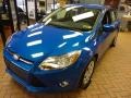 2012 Blue Candy Metallic Ford Focus SE Sedan  photo #5