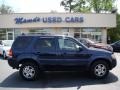 2004 True Blue Metallic Ford Escape Limited 4WD  photo #1