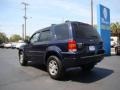 2004 True Blue Metallic Ford Escape Limited 4WD  photo #6