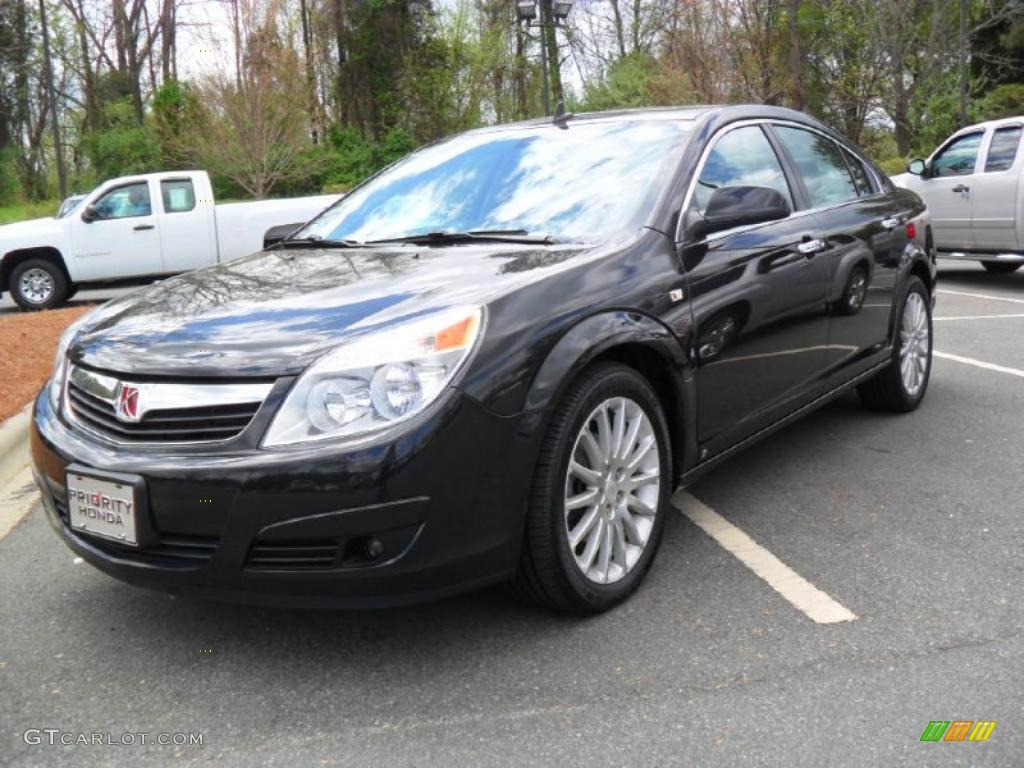 2009 Aura XR V6 - Carbon Flash Metallic / Black photo #1