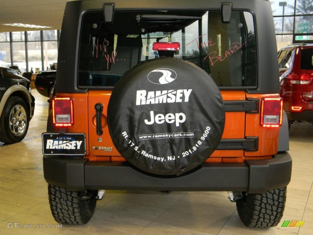 2011 Wrangler Sport 4x4 - Mango Tango Pearl / Black photo #8