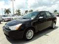 2010 Ebony Black Ford Focus SE Sedan  photo #13