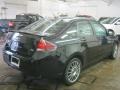 2010 Ebony Black Ford Focus SES Sedan  photo #2