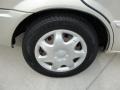 2000 Mazda Protege DX Wheel and Tire Photo