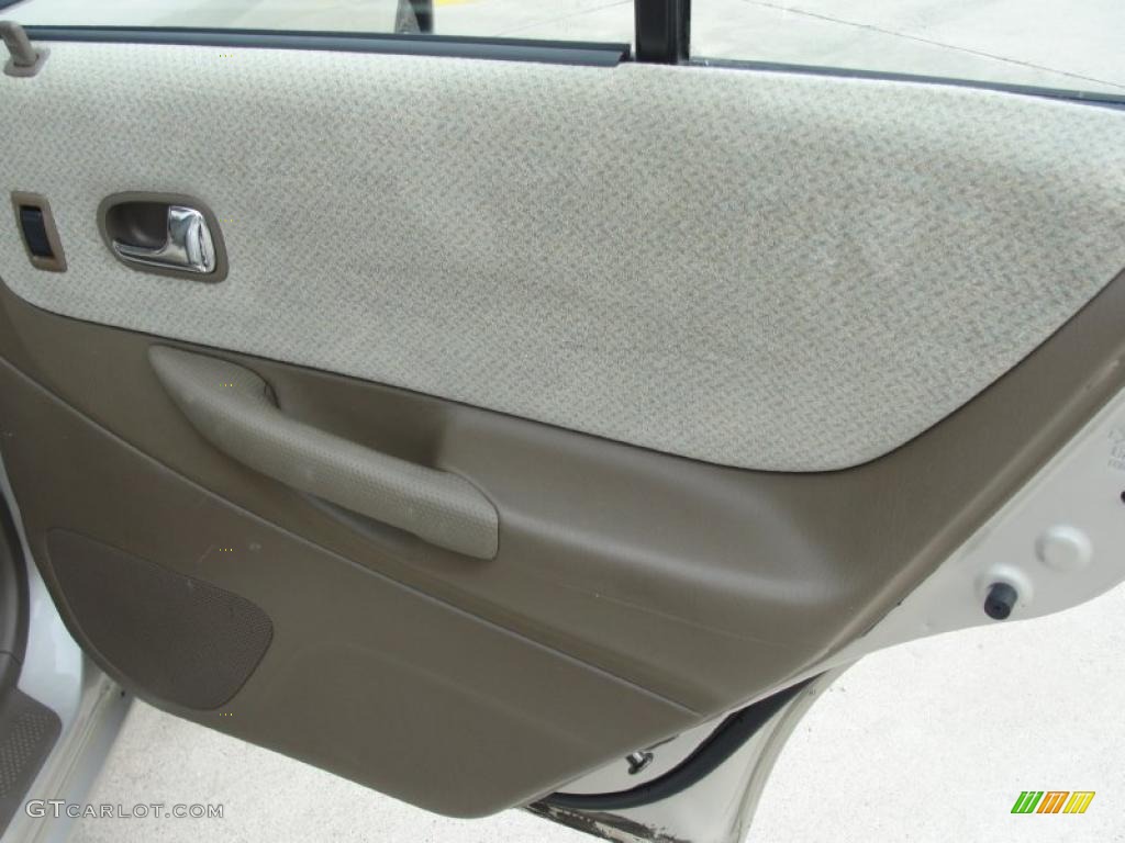 2000 Mazda Protege DX Beige Door Panel Photo #48054284