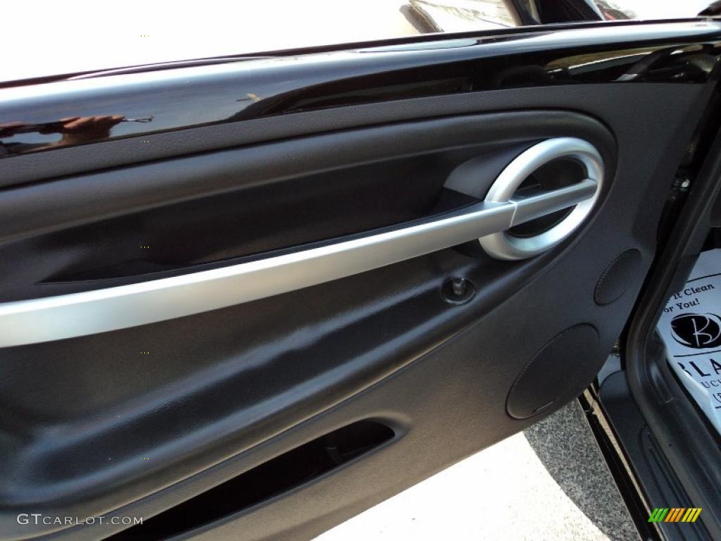 2004 Chevrolet SSR Standard SSR Model Ebony Door Panel Photo #48079988