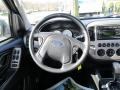 Ebony Black 2005 Ford Escape Limited 4WD Steering Wheel
