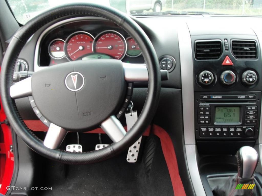 2006 Pontiac GTO Coupe Red Steering Wheel Photo #48137280