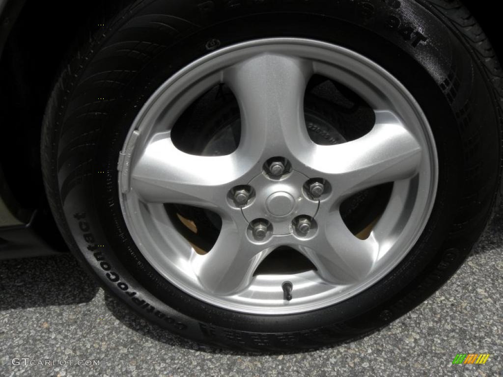 2003 Ford Taurus SES Wheel Photo #48151523