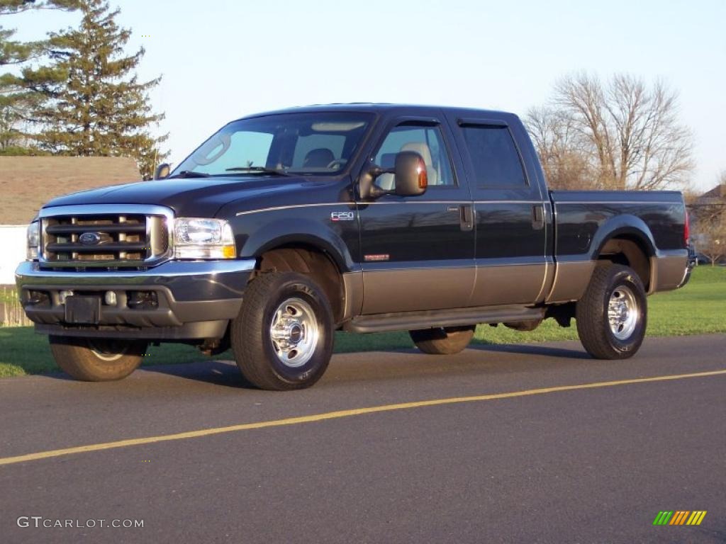 2004 F250 Super Duty Lariat Crew Cab 4x4 - Dark Green Satin Metallic / Medium Parchment photo #1