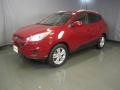 2010 Garnet Red Hyundai Tucson GLS AWD  photo #1