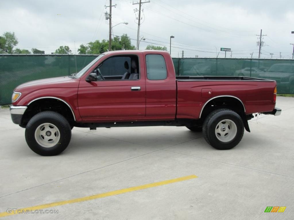 Sunfire Red Pearl 1995 Toyota Tacoma Extended Cab 4x4 Exterior Photo #48207664