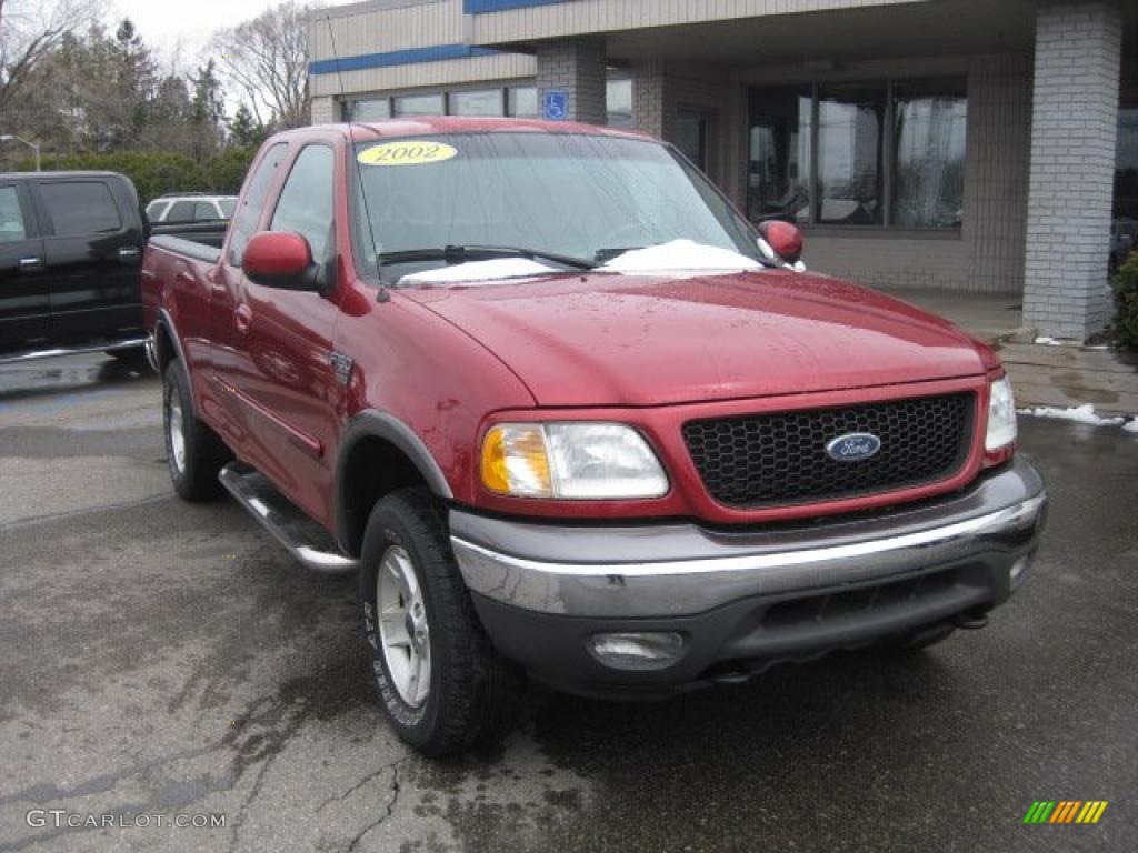 2002 F150 FX4 SuperCab 4x4 - Toreador Red Metallic / Medium Graphite photo #1