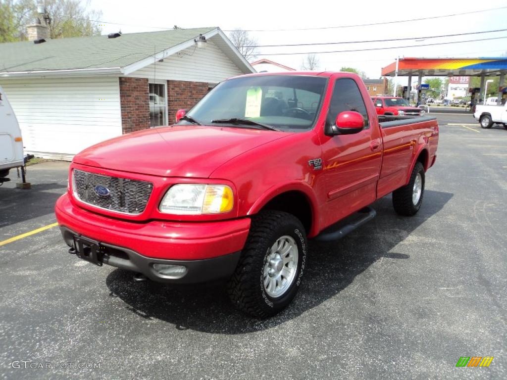 2002 F150 XLT Regular Cab 4x4 - Bright Red / Dark Graphite photo #2