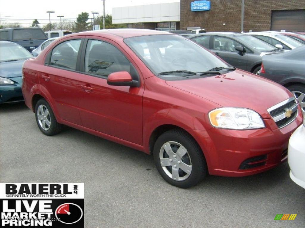 2010 Aveo LT Sedan - Sport Red / Charcoal photo #1