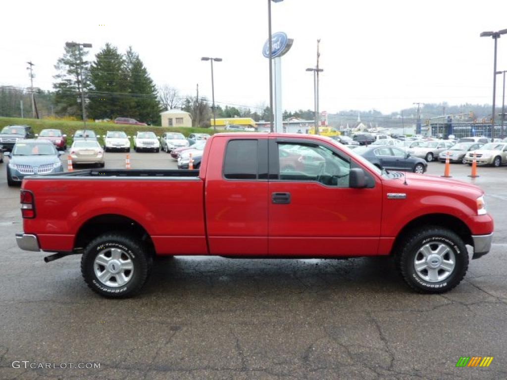 2004 F150 XLT SuperCab 4x4 - Bright Red / Black/Medium Flint photo #4