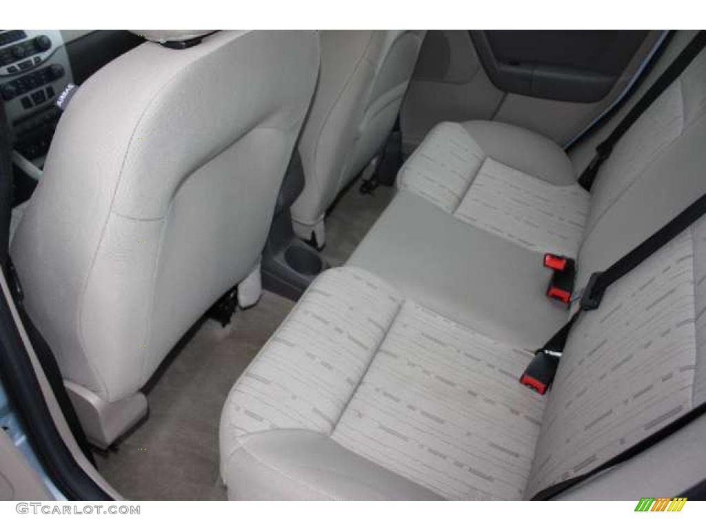 2009 Focus SE Sedan - Light Ice Blue Metallic / Medium Stone photo #21