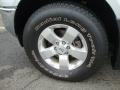 2010 Nissan Frontier SE V6 King Cab 4x4 Wheel and Tire Photo