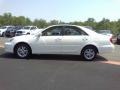 2004 Super White Toyota Camry LE  photo #18