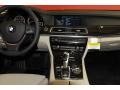 Oyster/Black Controls Photo for 2012 BMW 7 Series #48330154