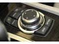 Oyster/Black Controls Photo for 2012 BMW 7 Series #48330298