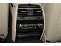 Oyster/Black Controls Photo for 2012 BMW 7 Series #48330340