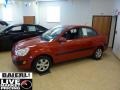 Tropical Red - Rio LX Sedan Photo No. 4