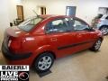 Tropical Red - Rio LX Sedan Photo No. 8