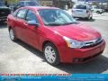 2010 Sangria Red Metallic Ford Focus SEL Sedan  photo #20