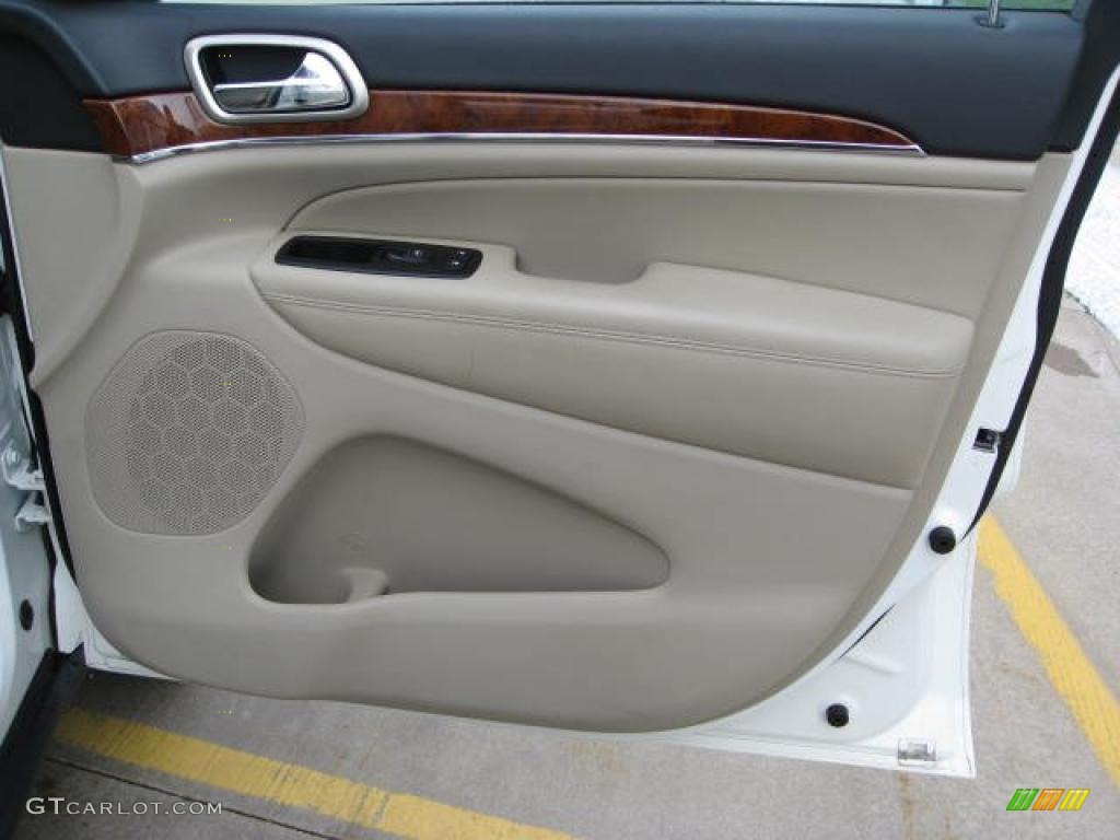 2011 Jeep Grand Cherokee Limited 4x4 Black/Light Frost Beige Door Panel Photo #48354787