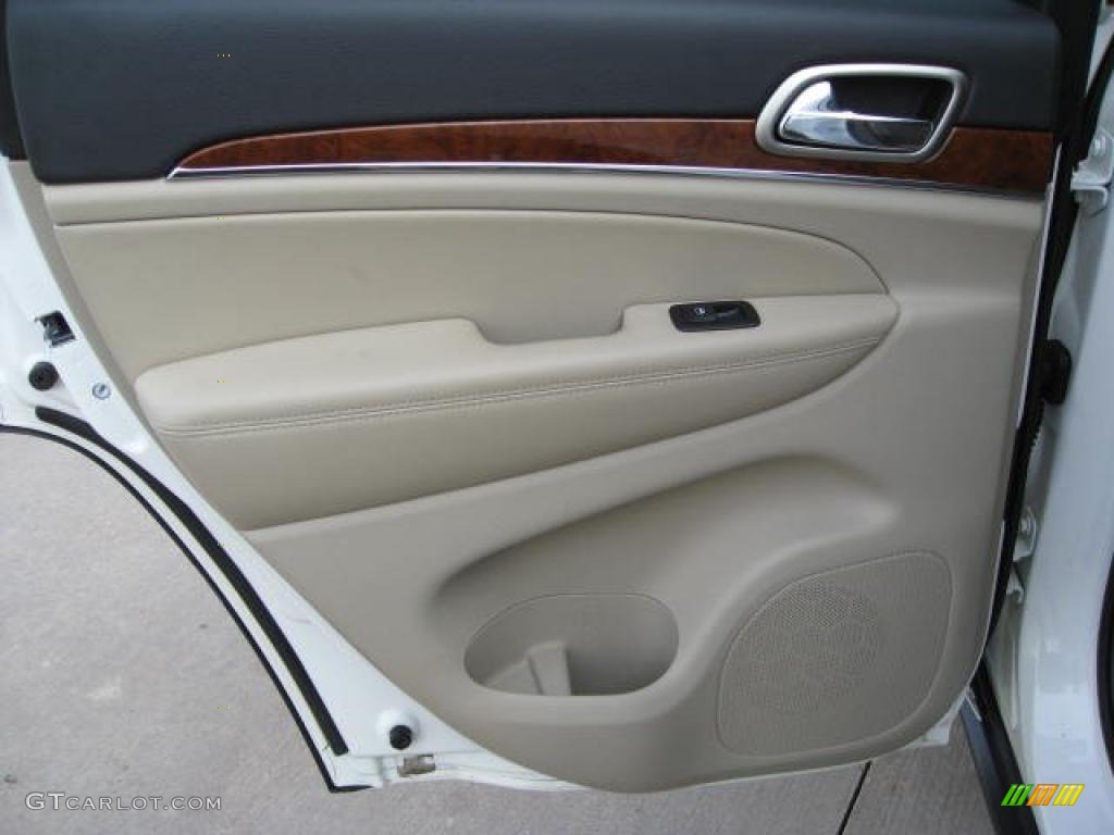 2011 Jeep Grand Cherokee Limited 4x4 Black/Light Frost Beige Door Panel Photo #48354844