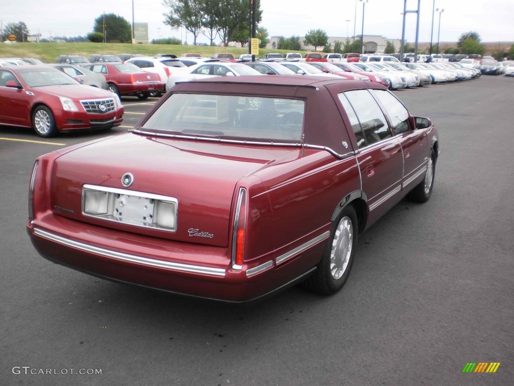 Crimson Pearl 1999 Cadillac DeVille Sedan Exterior Photo #48355045