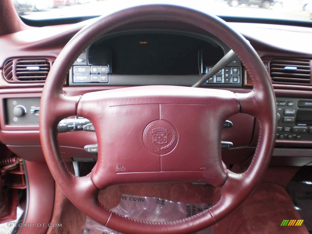 1999 Cadillac DeVille Sedan Mulberry Steering Wheel Photo #48355255